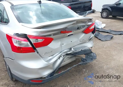 2014 Ford Focus Se z USA, uszkodzony, nr VIN 1FADP3F21EL320009